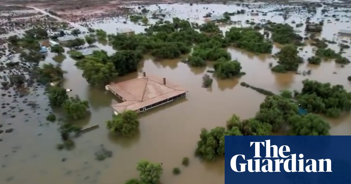 Drone video shows parts of Australia’s largest sheep station underwater in WA floods  video | Australia news