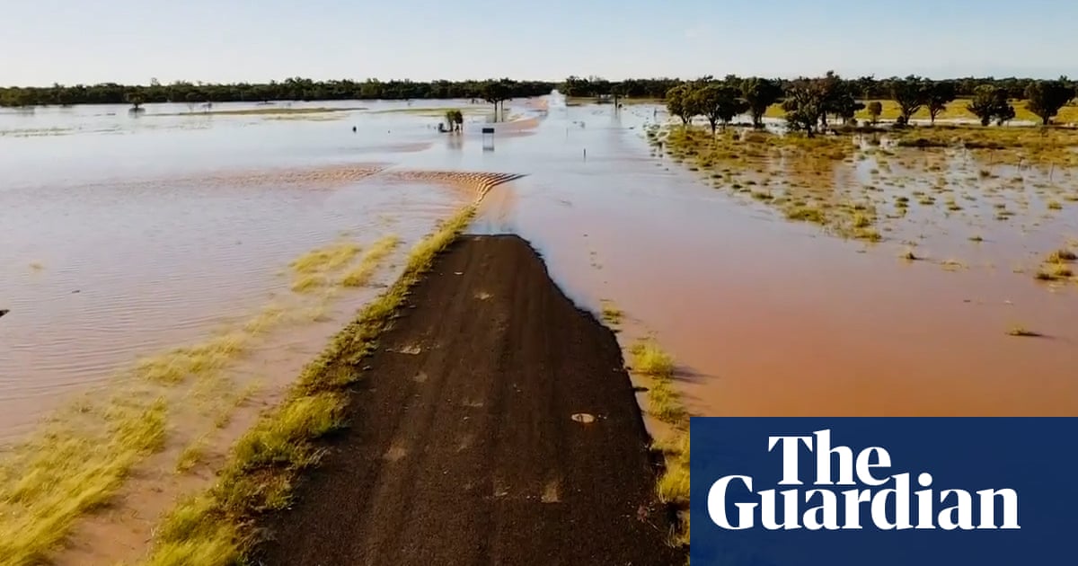 Drone footage captures flooded bridges and roads in rural parts of south-west Queensland  video | Australia news