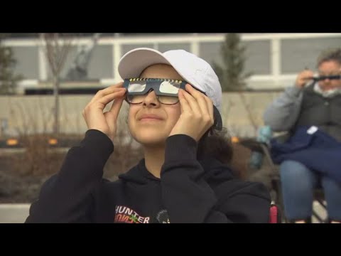 Manitobans travel near and far to watch partial solar eclipse [Video]