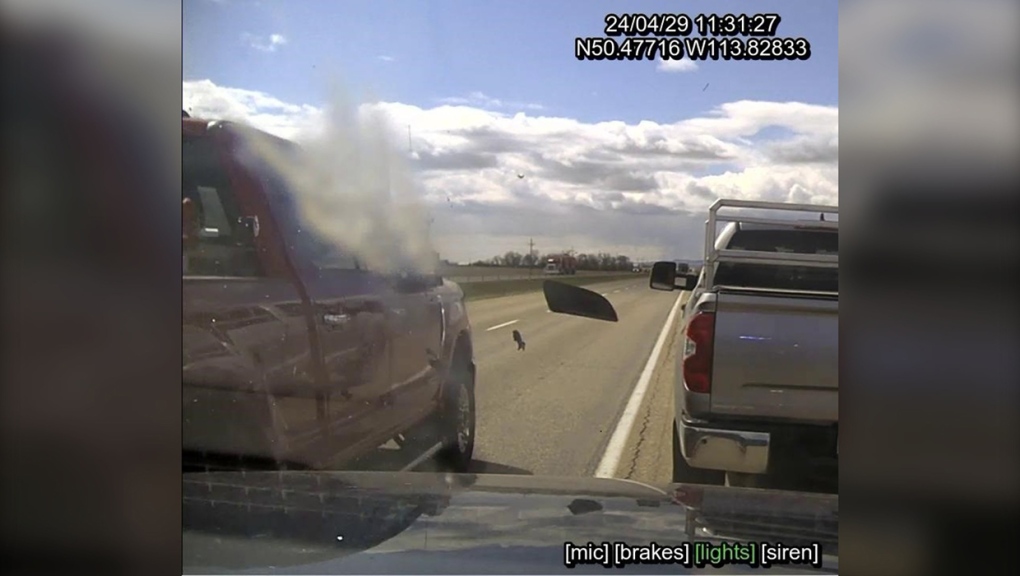 Trucks side mirror strikes RCMP vehicle as officer made traffic stop [Video]