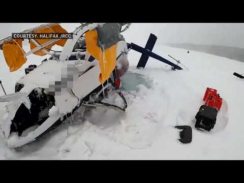 A helicopter crashed upside down in a frozen lake — and the pilot survived [Video]