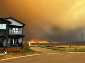 Wildfire closes in on Canadian oil sands city [Video]