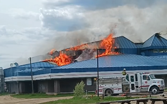 Emergency crews battling a fire at Waterhen School [Video]