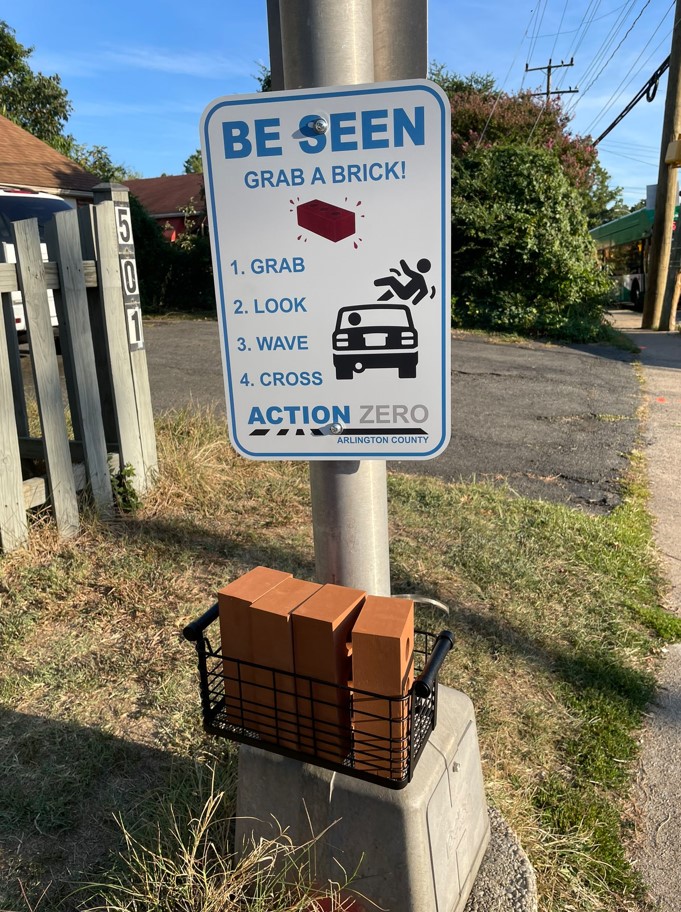 Arlington resident uses fake bricks to call for safer crosswalks [Video]