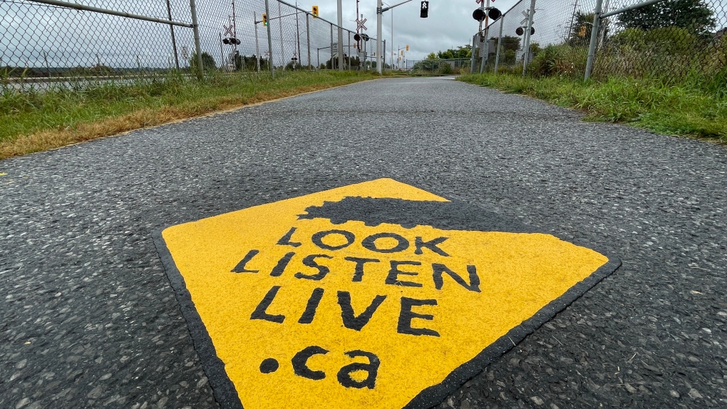 Look. Listen. Live. decals placed near Fallowfield rail crossing [Video]