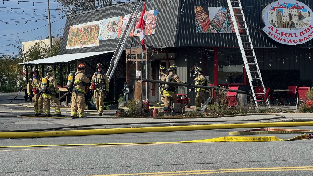 Bank Street fire: Man taken to hospital following commercial building fire [Video]