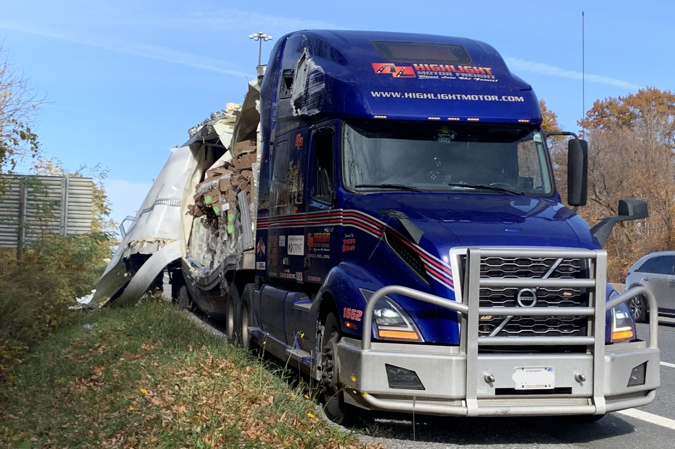 PHOTOS: Impaired trucker hits overpass making mess of Ontario highway, police say [Video]