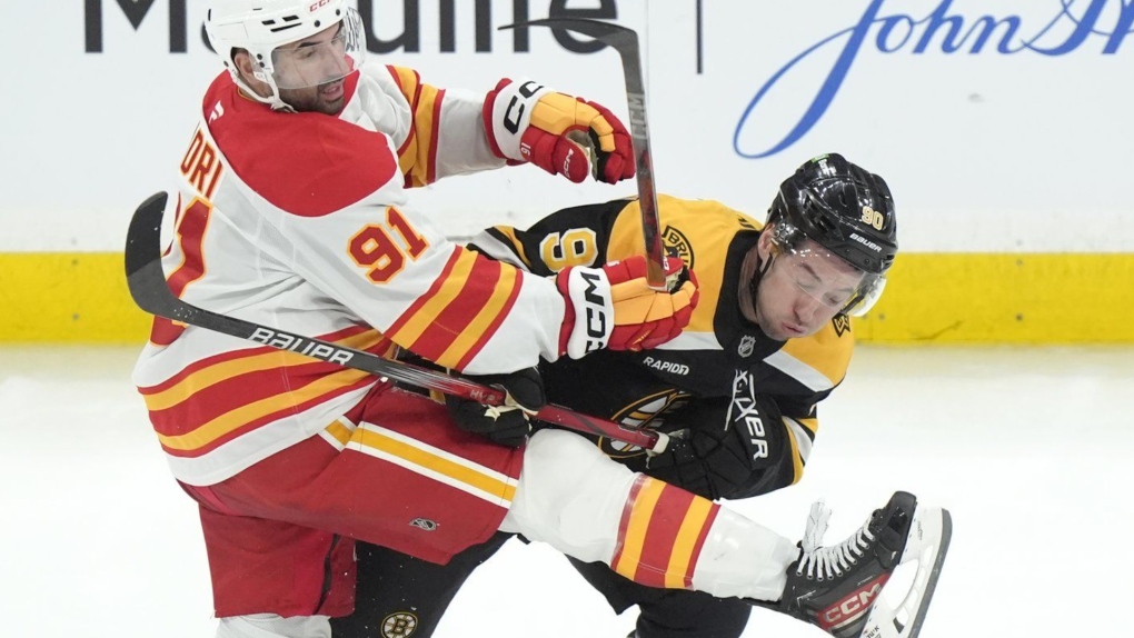 Brad Marchand scores OT goal to lead Bruins to 4-3 victory over Flames [Video]