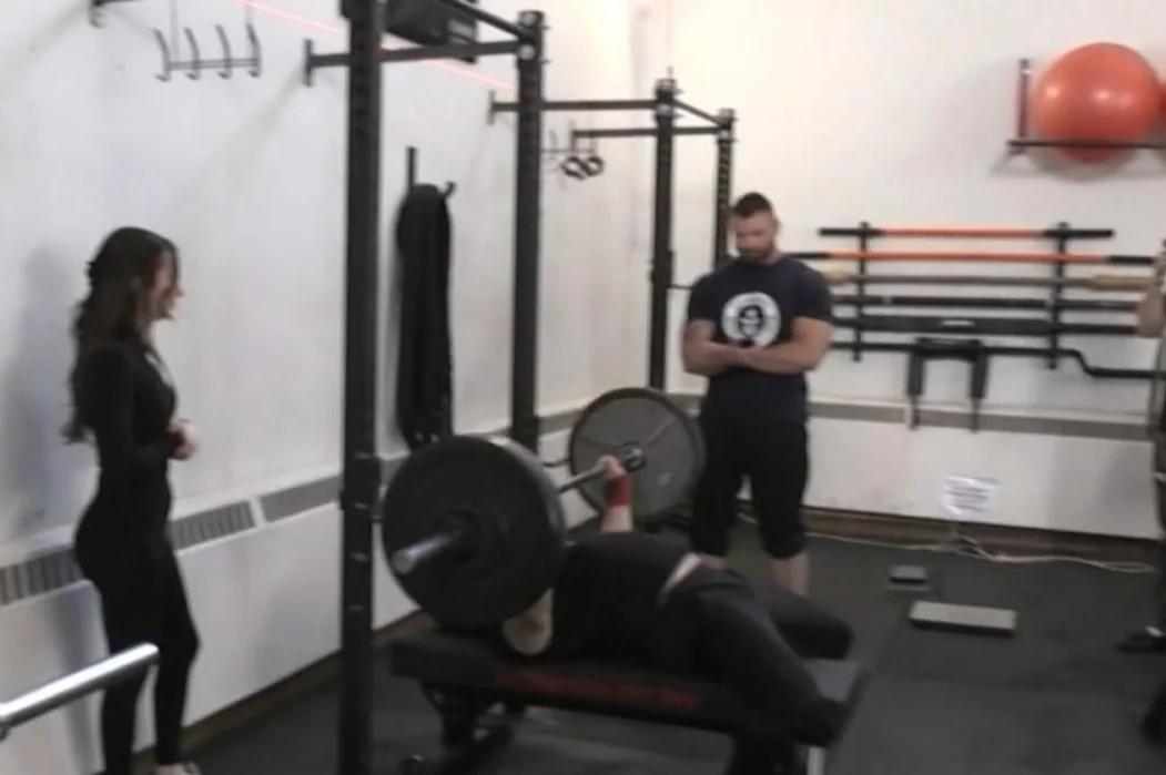 Ontario man bench presses his own weight to break world record [Video]