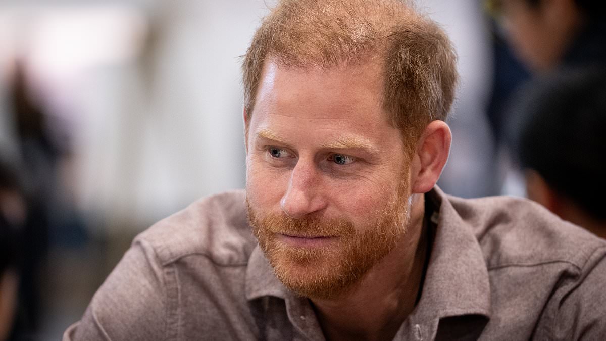 Prince Harry shows off his sporty skills as he plays a game of sitting volleyball with delighted children at Vancouver school [Video]