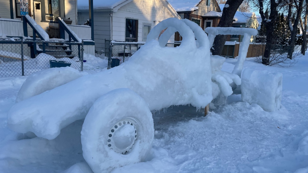 Winnipeg snow carvings: race car built in yard [Video]