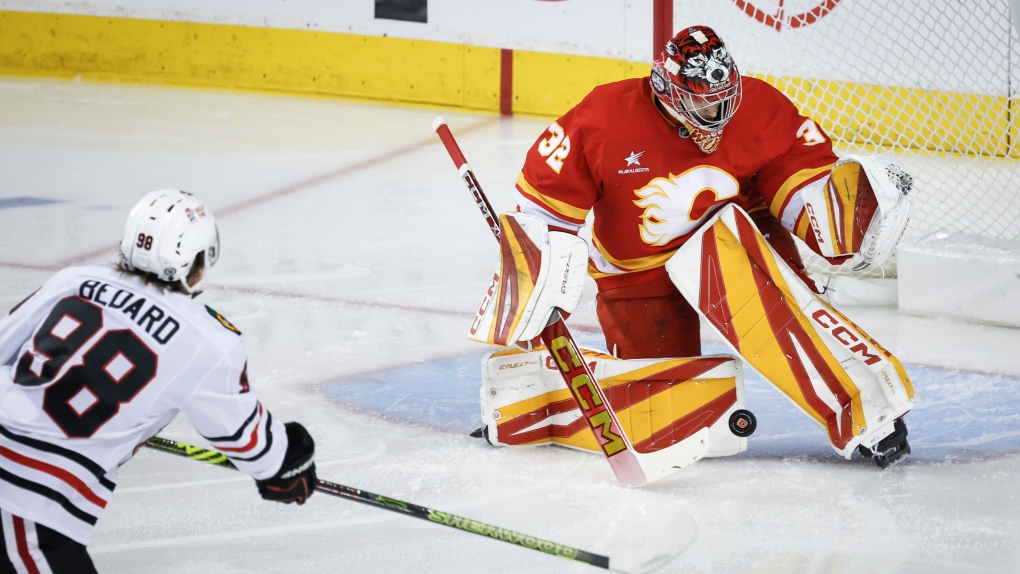 Flames get goals from 6 players in a 6-4 victory over the Blackhawks [Video]