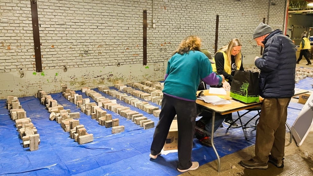 Saved Olympic Plaza bricks being picked up by purchasers [Video]