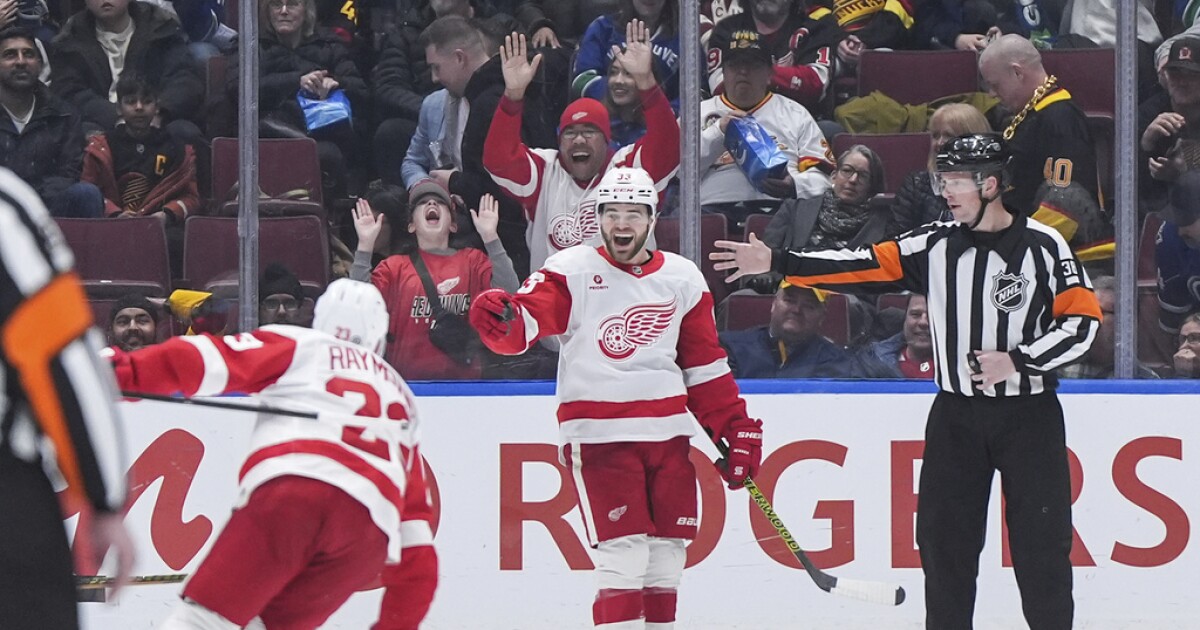 Alex DeBrincat scores in OT as Red Wings edge Canucks [Video]