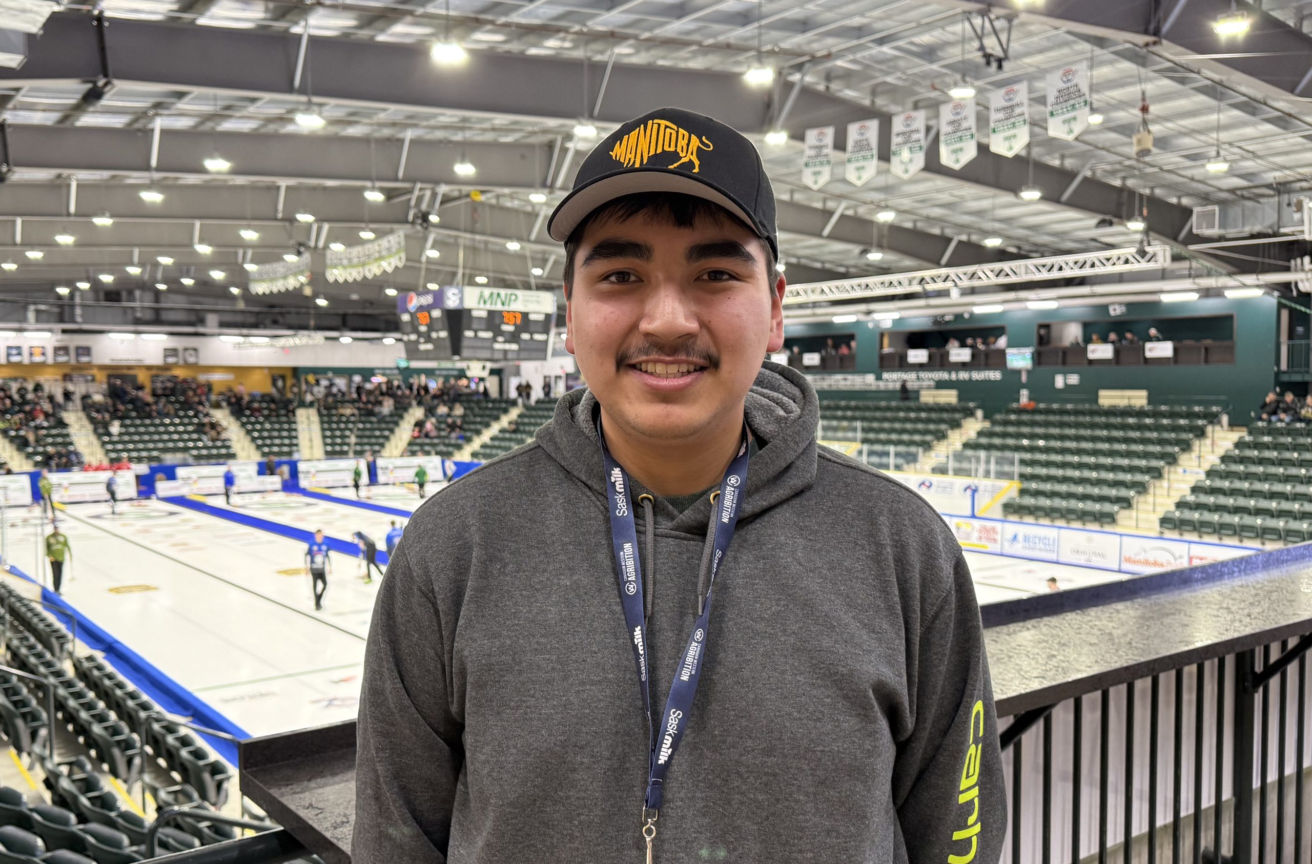 Local junior curler sends out ceremonial first rock of Men