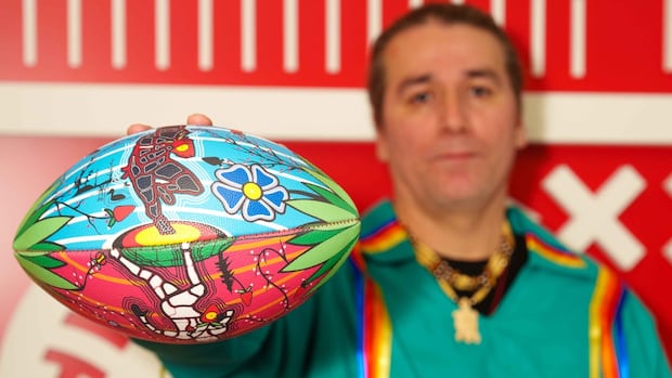 The NFL commissioned this Indigenous artist to decorate a football with art that showcases his culture [Video]