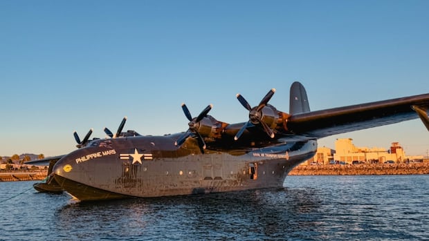 B.C.’s legendary Martin Mars water bomber makes final journey to its permanent home [Video]