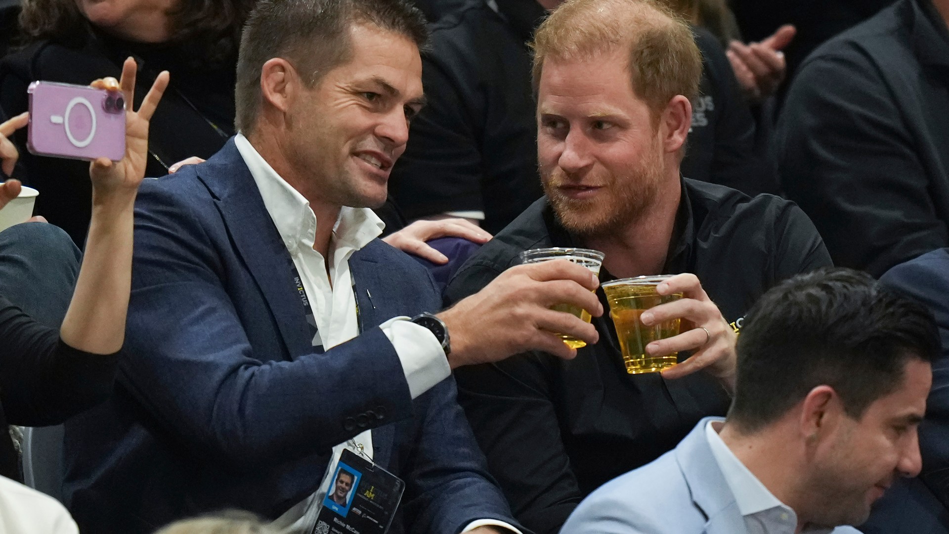 Prince Harry knocks back beers with rugby legend after Meghan jets off solo with pair spending Valentines apart [Video]