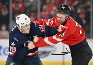 Fist-fights, anthem boos in stormy US, Canada ice hockey clash [Video]