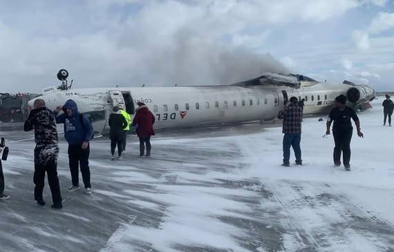 Delta Airline Crash at snow-covered Toronto Airport leaves several passengers injured (VIDEO)