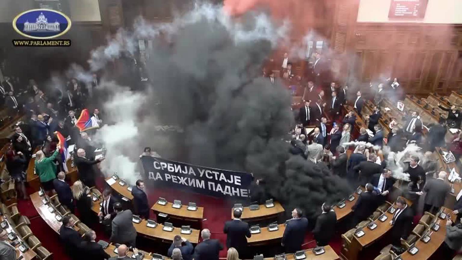 Video: Serbian opposition lawmakers throw smoke grenades, tear gas inside parliament [Video]