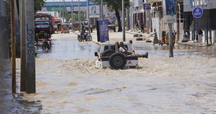 At least seven people die as heavy rains leave waist-high floodwaters in Somalias capital – National [Video]