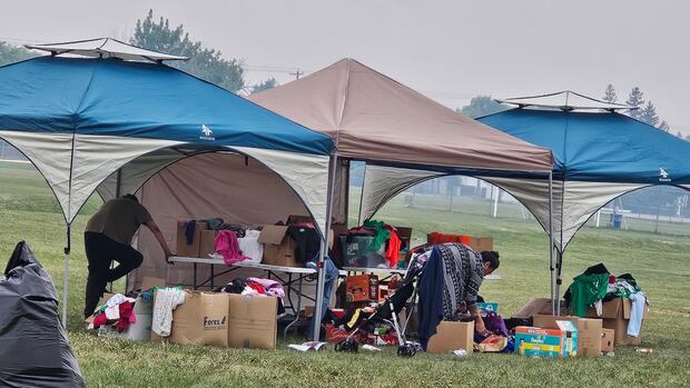 Wildfire evacuees, allowed to carry just 1 bag as they fled, in need of donations [Video]